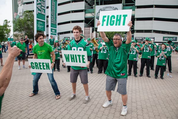rider fans showing team spirit before a football game